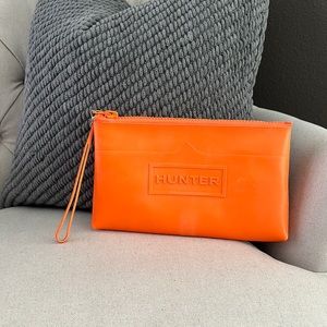HUNTER orange rubber wristlet